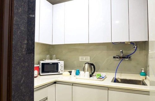 Gurugram Apartment | Relaxing 1 Bhk service apartment with balcony Gym