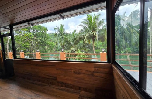 Thenmala House | River Portico