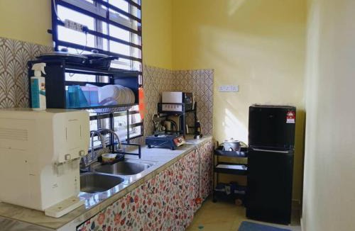 Rambai House | RumahKuningHOMESTAY