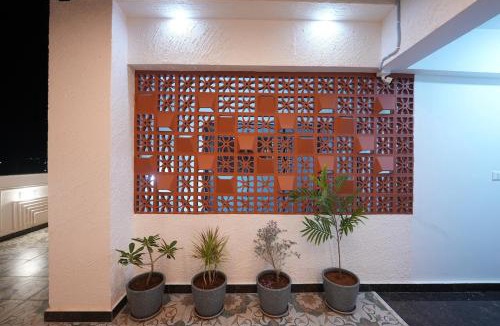 Devanahalli Apartment | Runway Retreat Rooftop Swing, Airport View