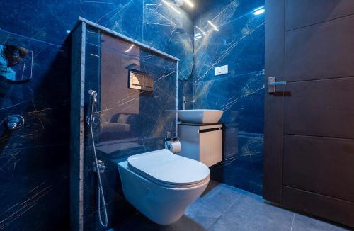 Devanahalli Apartment | Runway Retreat Rooftop Swing, Airport View
