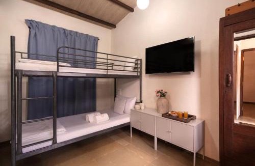 Palghar Villa | SaffronStays Bay Watch - 3BR beachfront pool villa with bonfire, gazebo & coconut grove lawns along Kelwa shoreline