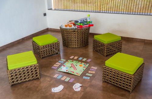 Nashik Villa | SaffronStays Mango Lakeview Villa - 3BR pool villa amid mango farms with Gangapur Dam views, deck & games