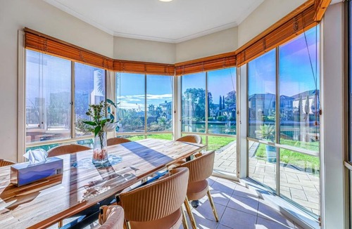 Sanctuary Lakes House | StayAU Sunset Two Story Lakeside Oasis with Scenic Yard