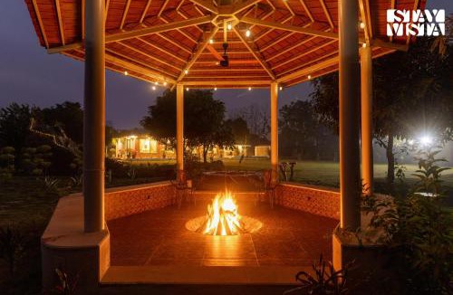 Gurugram Villa | StayVista at Bagaan Farm Stay with Private Pool & Golf Putting Area