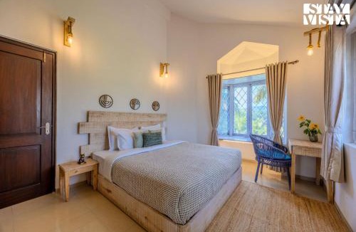 Nagoa Villa | StayVista at Cerulean Frame with Pool, WiFi