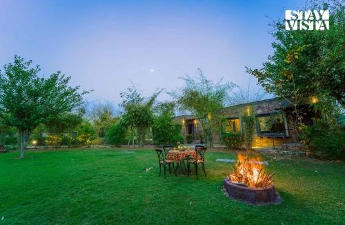 Achrol Villa | StayVista at Mulberry Tree House with Lawn, BBQ
