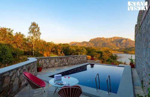 Bedla Villa | StayVista at Saket Loak with Pool, Lawn