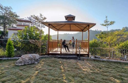 Bullawala Villa | StayVista at Stonecrest - Lawn & Mountain View