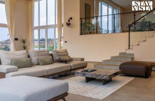 Anjaneri Villa | StayVista at Vayu Farm with BBQ, Bonfire & Lake View