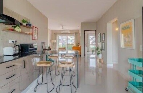 Nerul Apartment | Stylish 2BHK Condo with Pool Access & Gym Near Candolim Beach