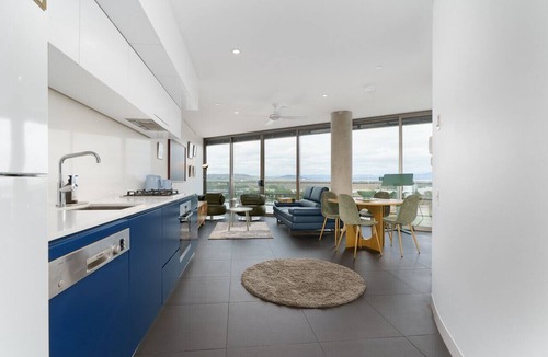 City West Apartment | Stylish Top-Floor Apt with Lake and Mountain Views