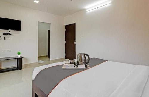 RT Nagar Hotel | The Blooms Stay Inn