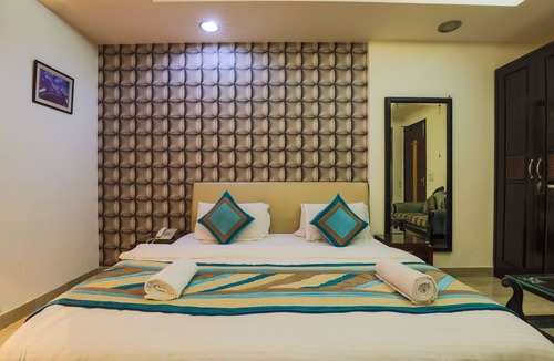 East of Kailash Hotel | The Hermitage by Cosy Hotels
