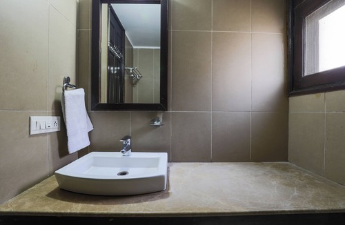 East of Kailash Hotel | The Hermitage by Cosy Hotels