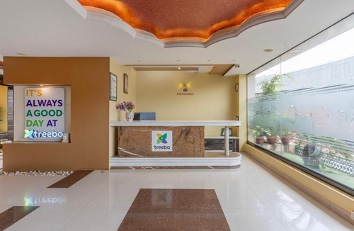 Nagavara Hotel | Treebo Premium Raj Elegance Manyata Tech Park