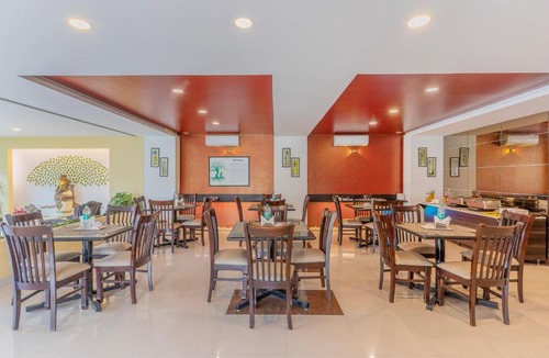 Nagavara Hotel | Treebo Premium Raj Elegance Manyata Tech Park