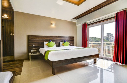 Kolhapur Hotel | Treebo Shree Sai Suites - 2km from Mahalaxmi Temple