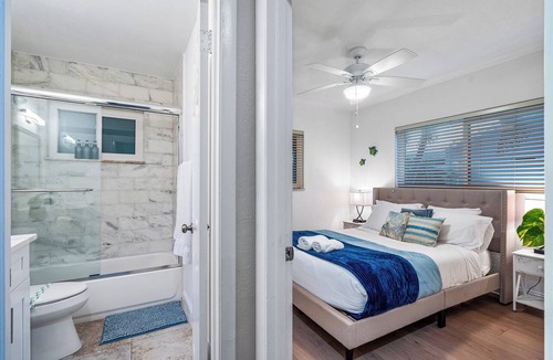 Tropic Palms House | VacationSunwind:Delray home! SW Pool, Fish, Dock, Water front, Close to Bch