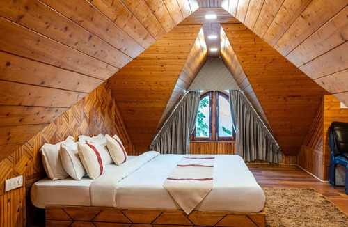Cheog Hotel | WoodVista Cottages By Jomotel