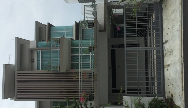 A well-decorated 3-storey house near Malaysia-Singapore border checkpoint.