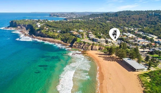 Beachside escape steps from the surf & village