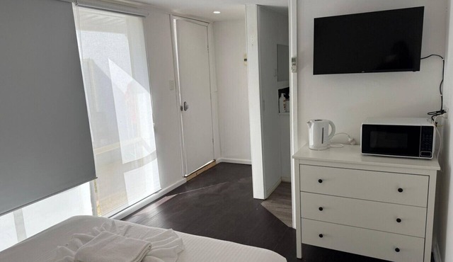 Cozy Budget Studio with AC and Private Bath