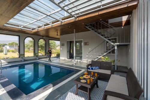 ELIVAAS Jamun Farm 2BHK with Pool