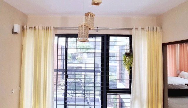 Family apartment with modern decor. Close to Airport and CBD