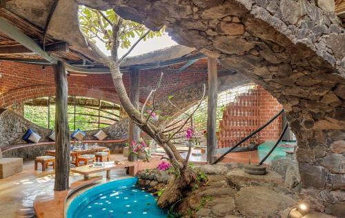 SaffronStays Terracotta Trails - 2BR eco-luxury villa with earthy design, pool, open lawns & sustainable living in Wada