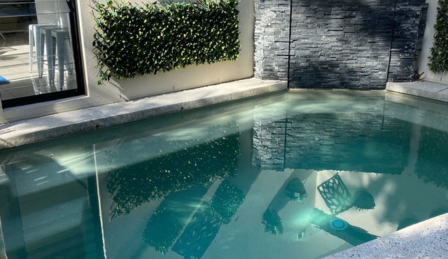 SPACIOUS BEACH HOUSE in beautiful Dicky Beach with private pool. in Dicky Beach