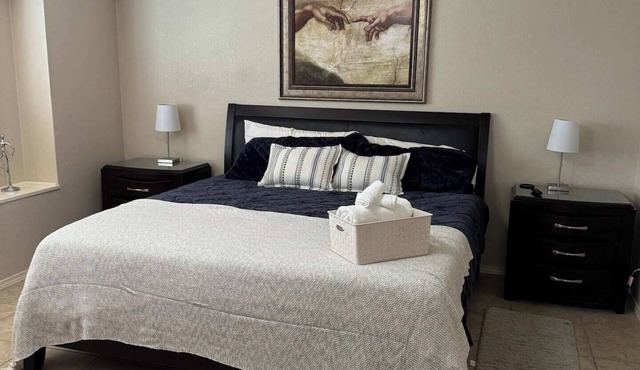 Spacious & comfortable home perfect for groups or remote workers! Features 2 living rooms, a dedicated office nook, and a fully stocked kitchen. Relax in the private, sunny backyard. in El Paso