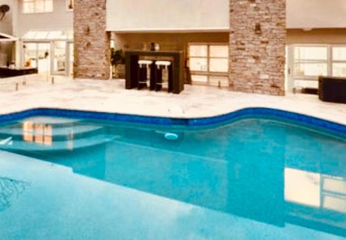 Spacious Luxury Home w Pool Sportscourt Forest Water City Views