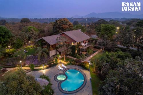 StayVista at Brickhouse Aranya with Pool and Farm View
