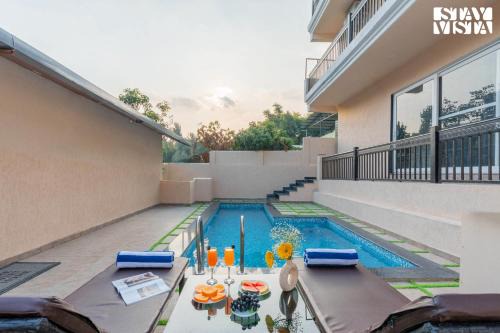 StayVista at Elysian Forest Villa with Pool