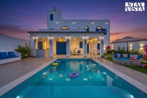 StayVista at Santorini Villa with Pool, Lawn