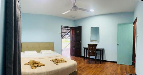 Sukau Backpackers Bed & Breakfast