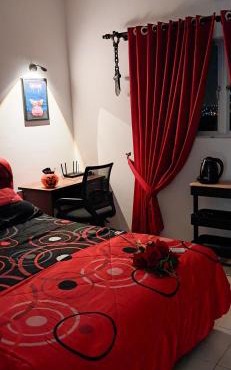 The Red Room Alanis Residence