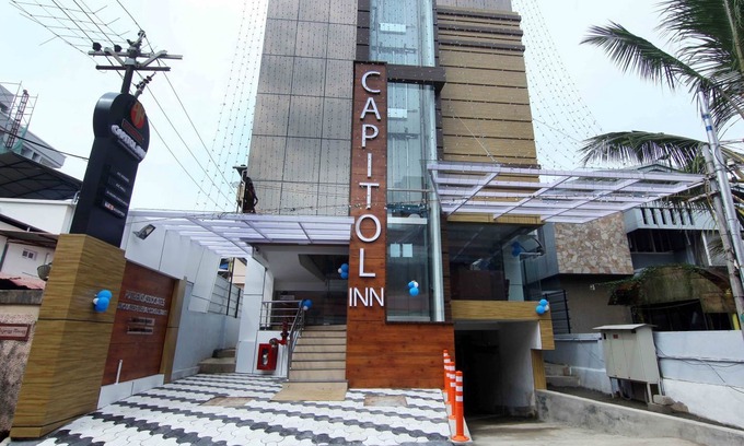 Kaloor Hotel | OYO 18604 Puthens Capitol Inn
