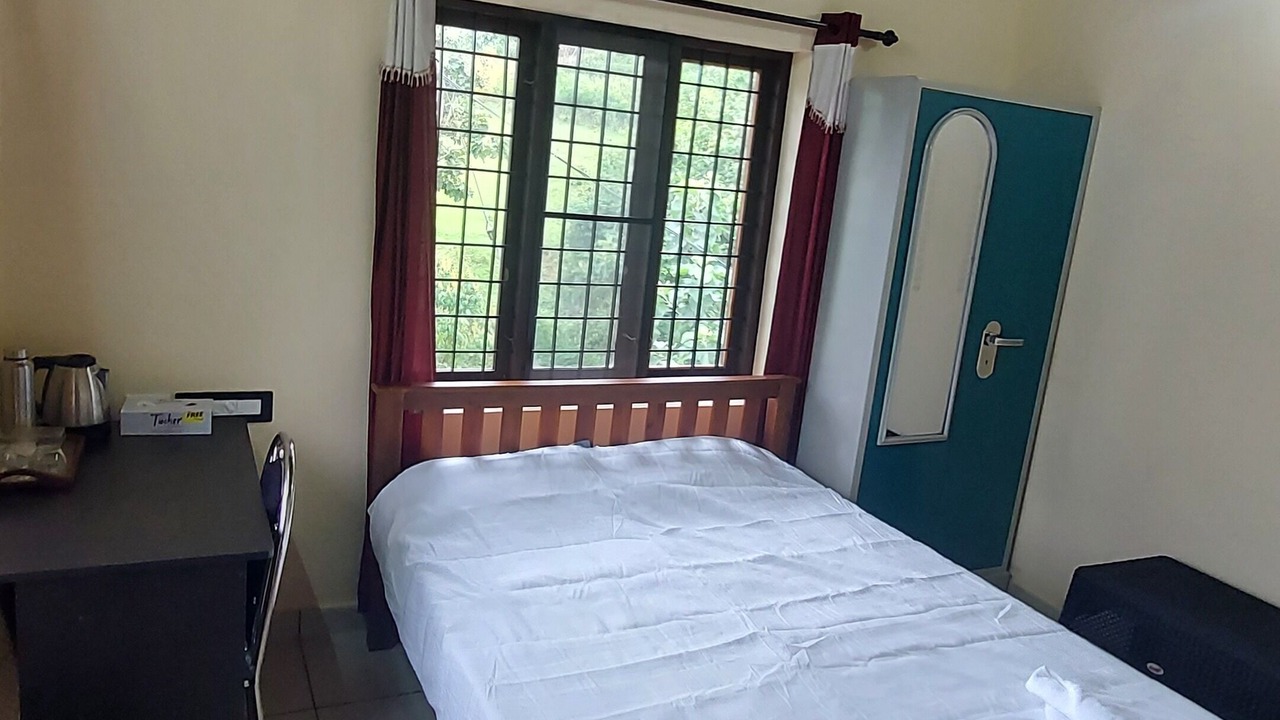 Photo of Bedroom in Mannarkkad