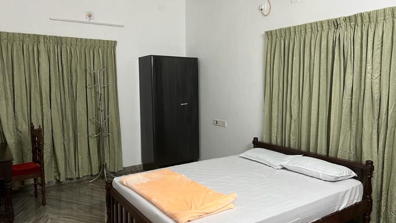 Photo of Bedroom in Irinjalakuda