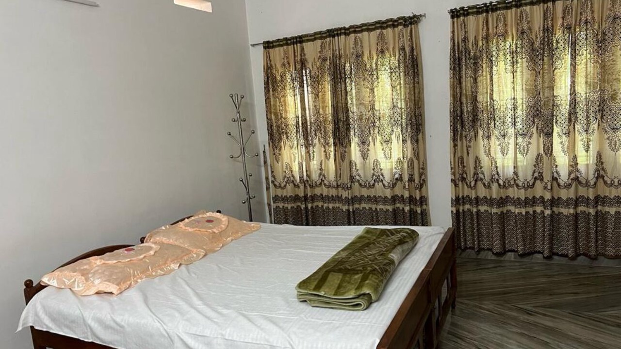 Photo of Bedroom in Irinjalakuda