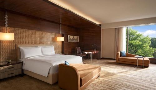 Presidential Suite with complimentary Breakfast & Club access with unlimited IMFL Beverages 5PM to 7PM