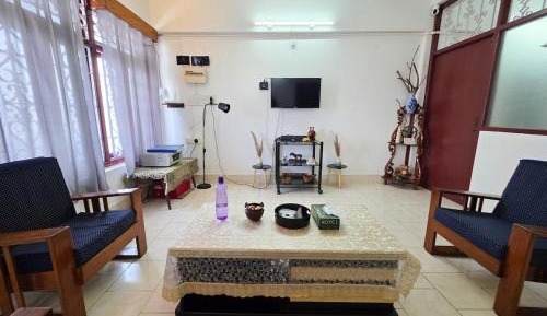 Four-Bedroom Apartment with Balcony 