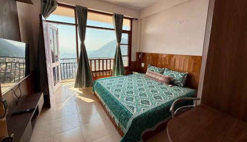 One-Bedroom Apartment with Balcony and Mountain View  