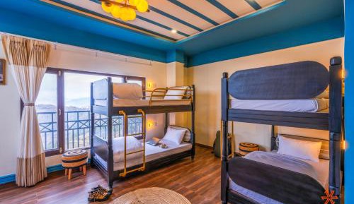 Deluxe 6 Bed Mixed Dorm (with balcony and mountain view)