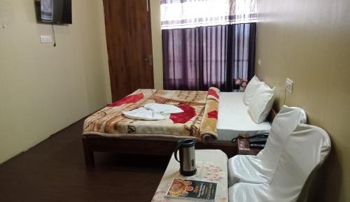 Deluxe Room (2 Adults + 1 Child)