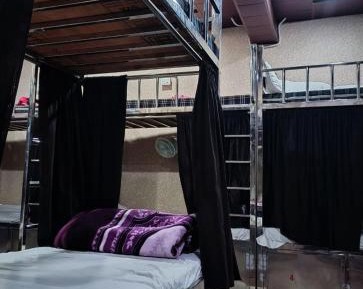 Single Bed in Dormitory Room