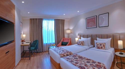 Deluxe Room - 2 Single Beds with 15% discount on food, beverages, spa and laundry | Happy Hours from 12pm to 7pm