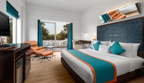 Premium Room with Balcony & with Happy Hours-1+1 offer on Alcoholic Beverages, 15% Off on Laundry service, Complimentary In-Room Refreshments featuring Cookie Platter , 15% off on Food & Beverage services